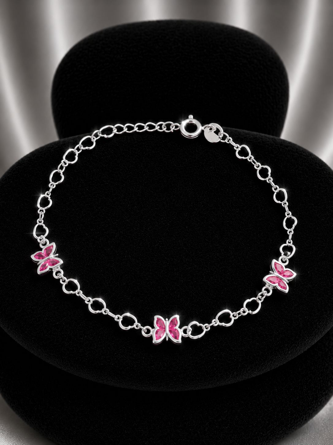 Pulsera triple mariposa rosada