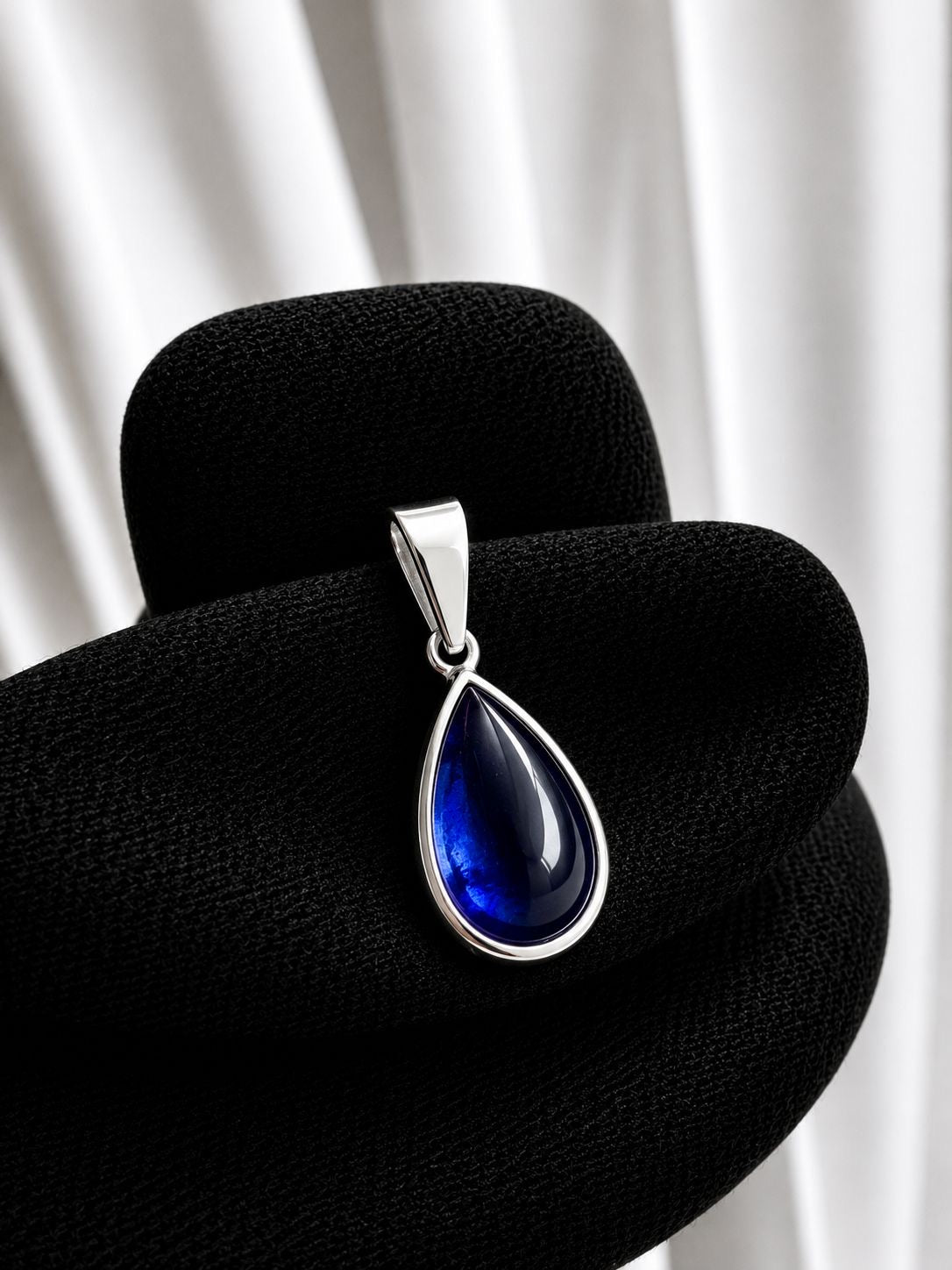Medalla gota azul oscuro