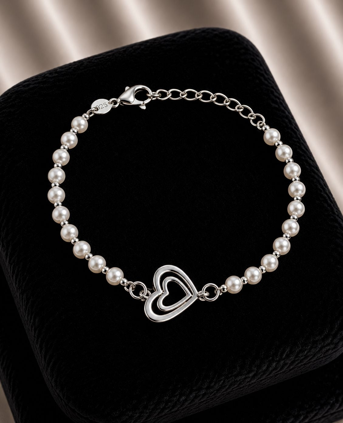 Pulsera corazón con perlas