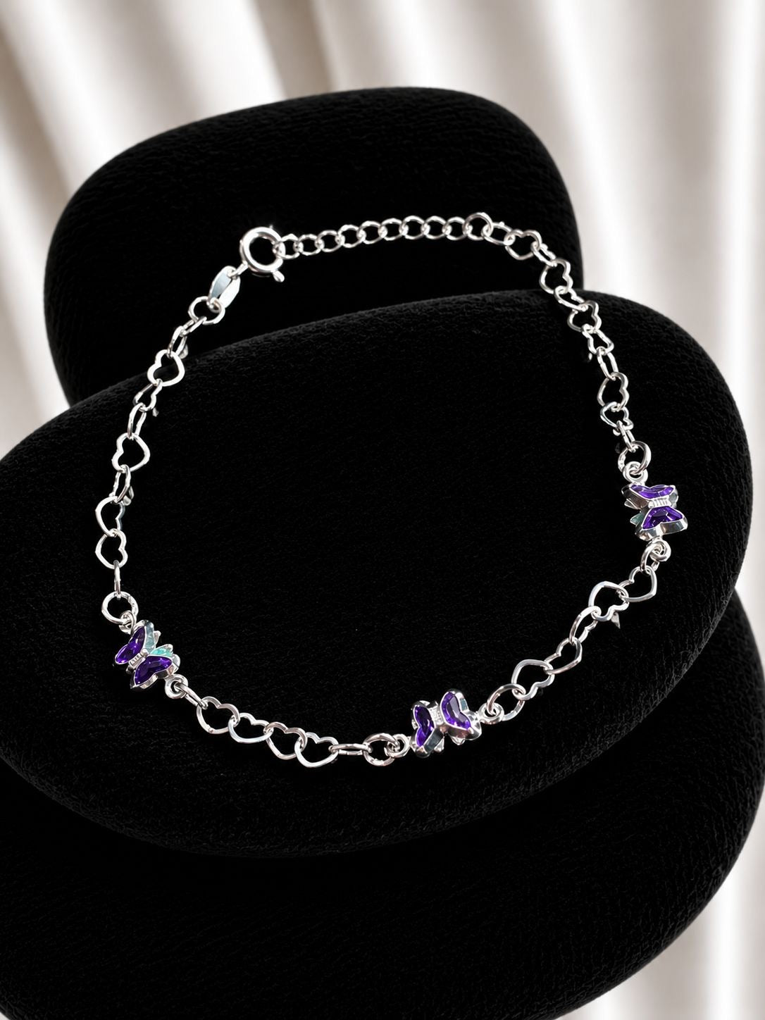 Pulsera triple mariposa circon morado