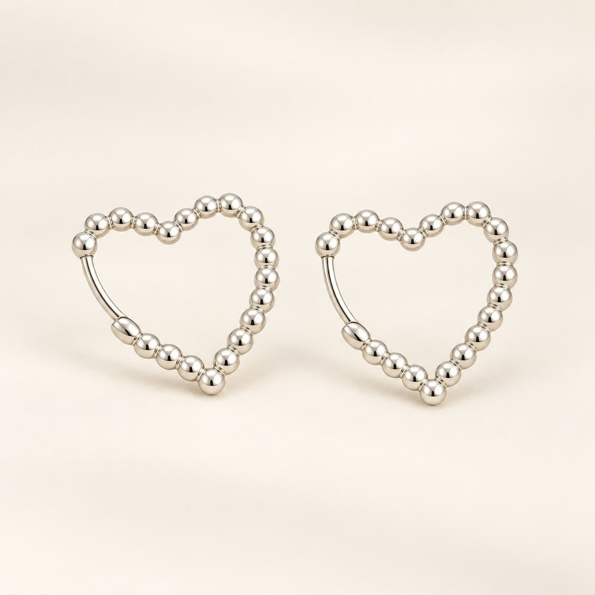 Aros corazones con esferas