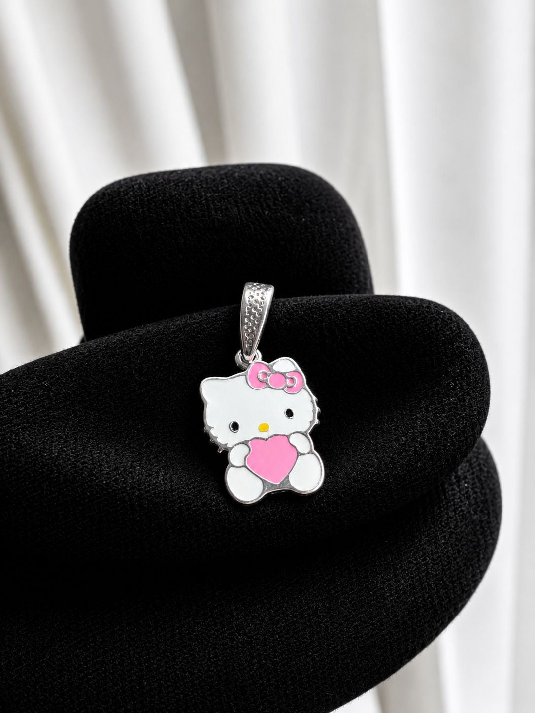 Medalla hello kitty rosa