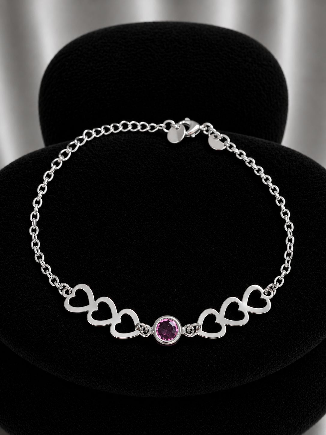 Pulsera triple corazón con circón rosa