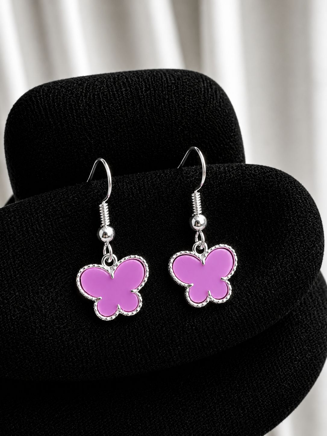 Aros colgante mariposa fucsia
