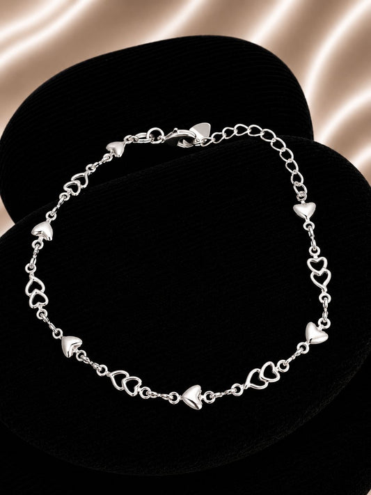 Pulsera de corazones calados con corazones de plata