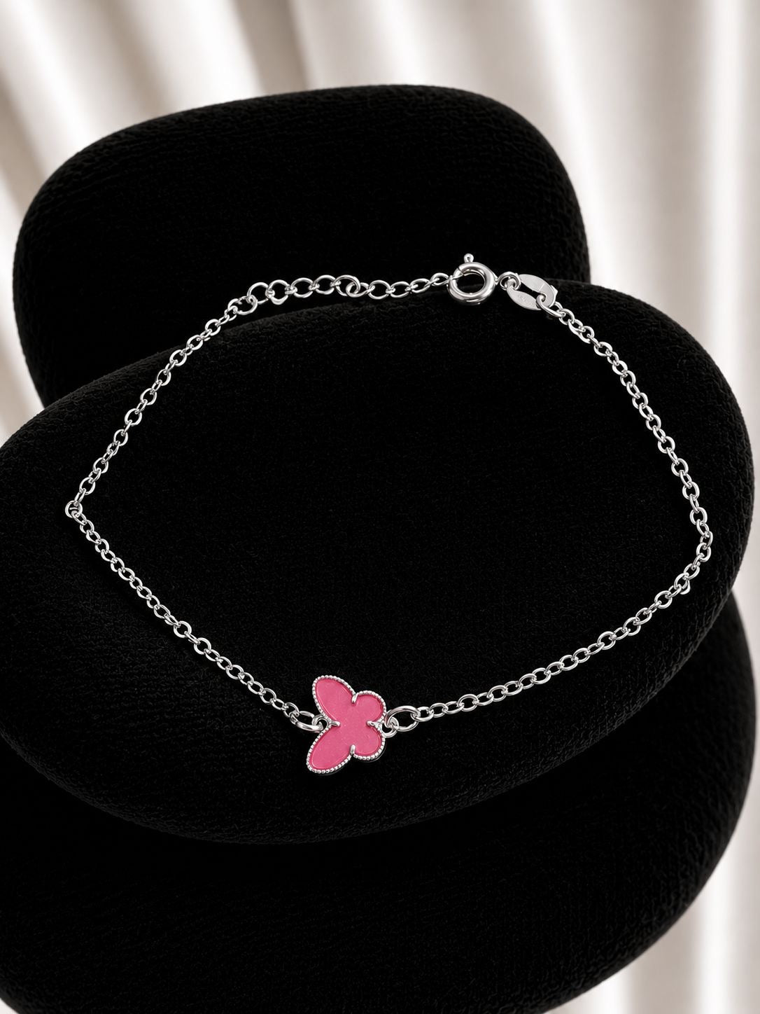 Pulsera mariposa rosa con resina