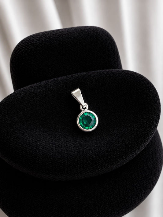 Medalla circon verde circular pequeño