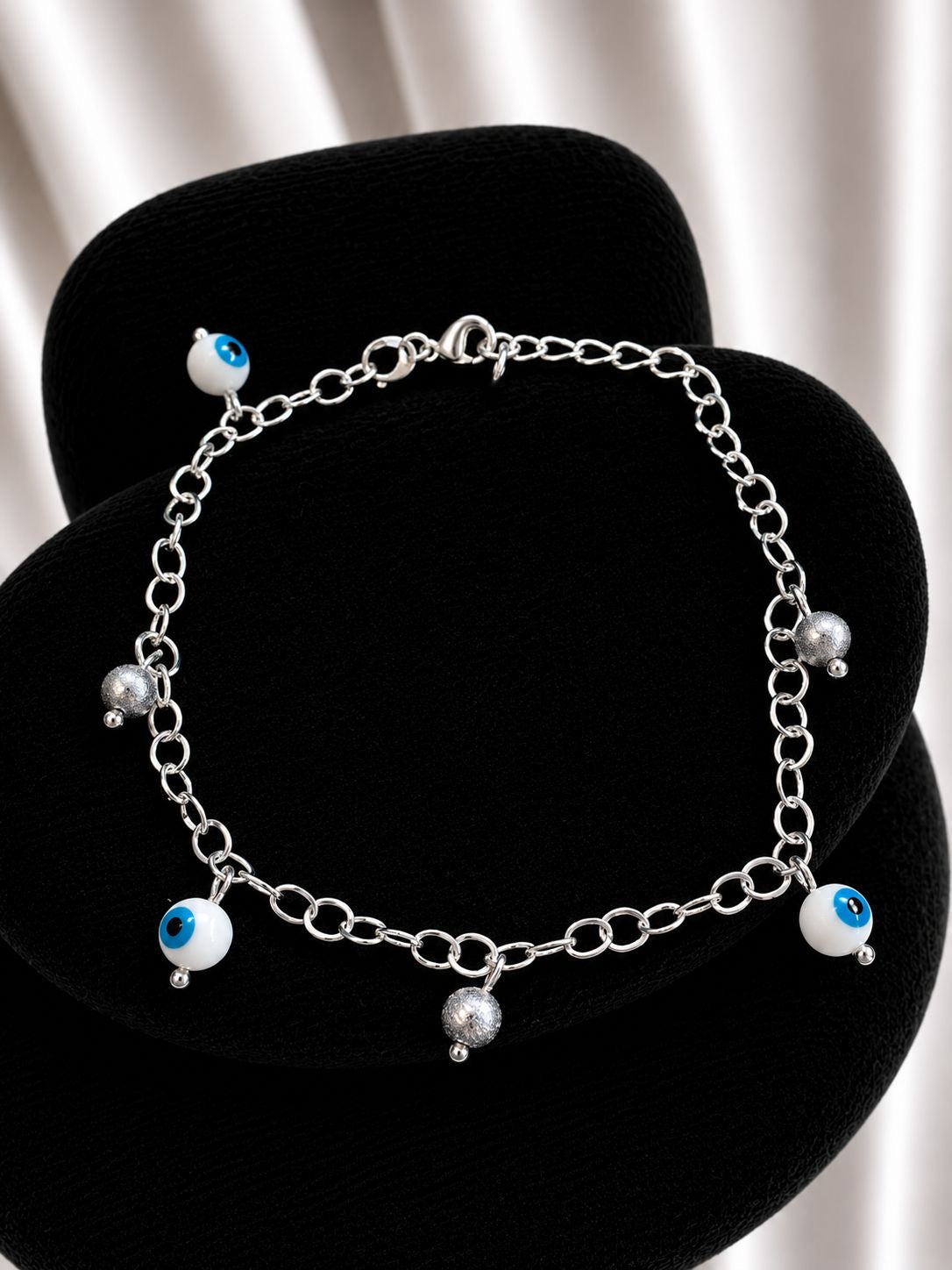 Pulsera ojo turko con pelotitas facetiadas
