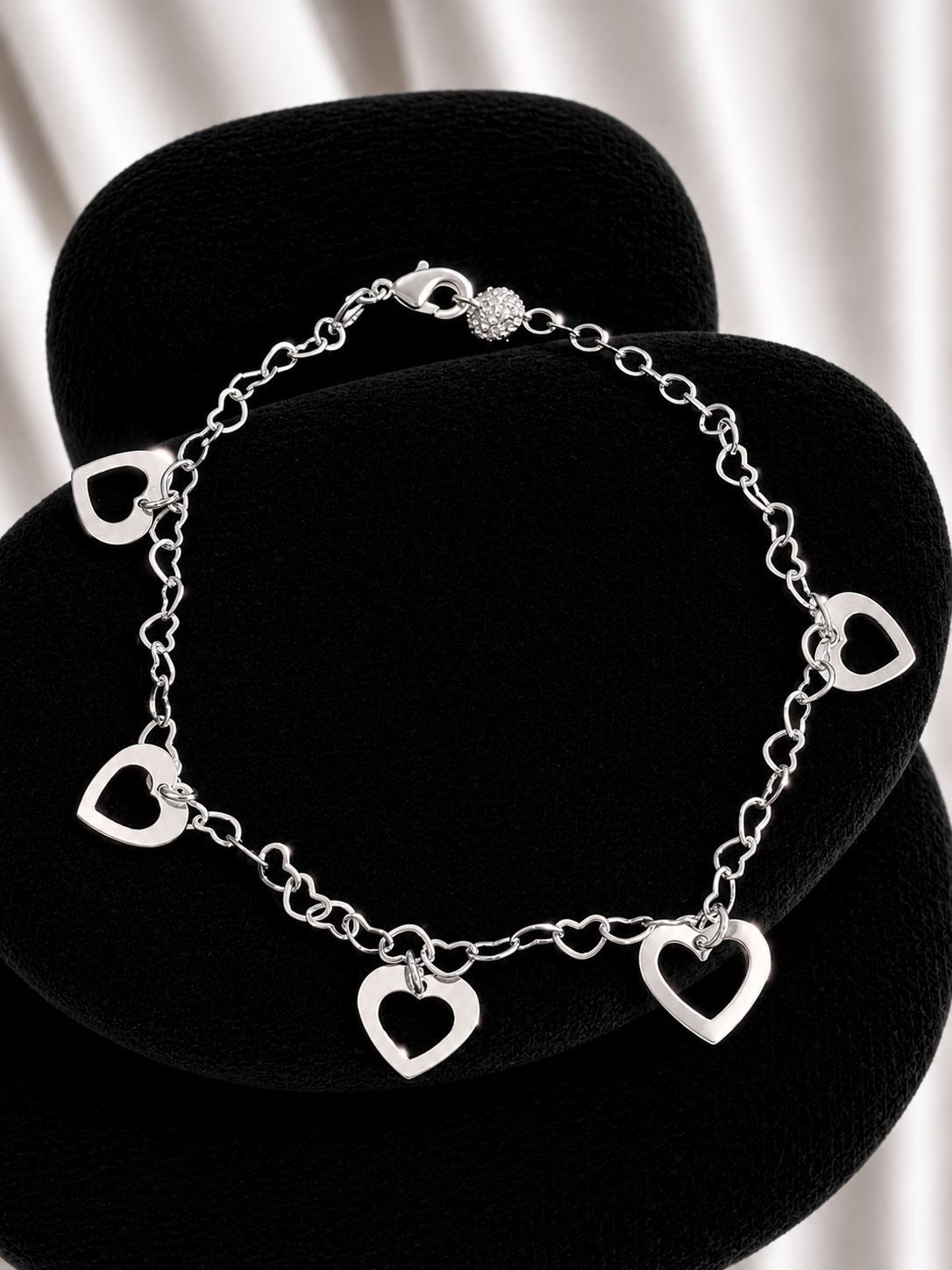 Pulsera de corazón con corazones de plata