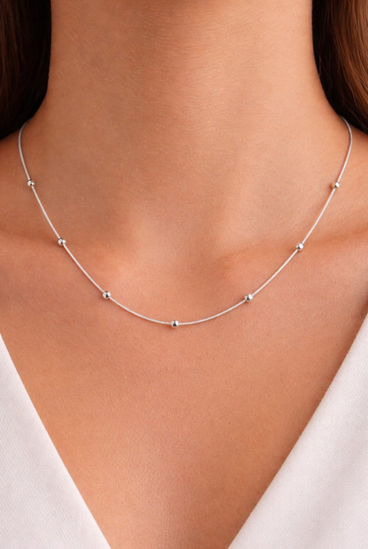 Cadena cola de topo con bolitas