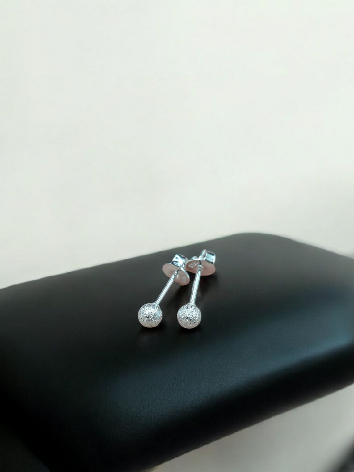 Aros bolitas facetiadas
