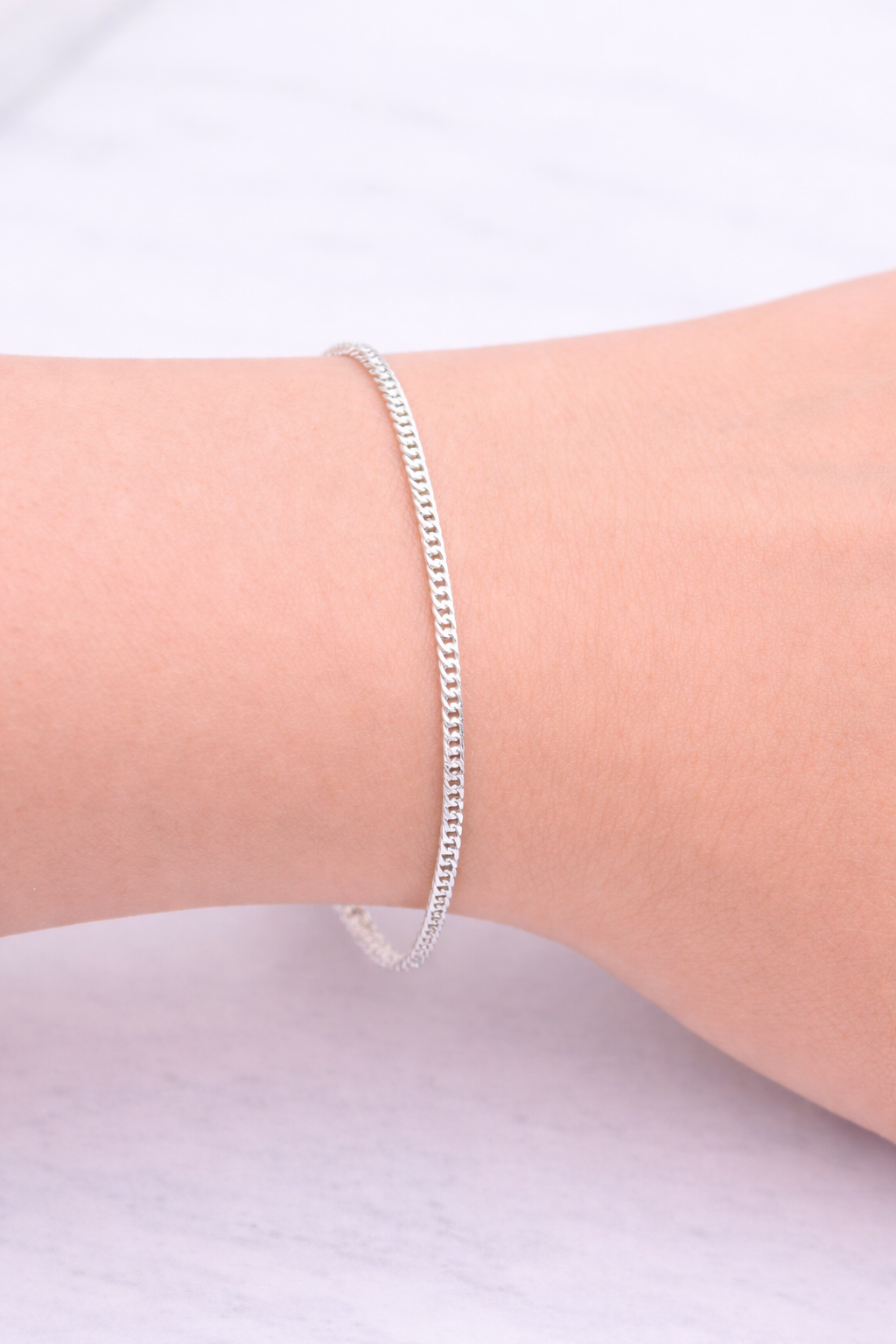 Pulsera triple grumet