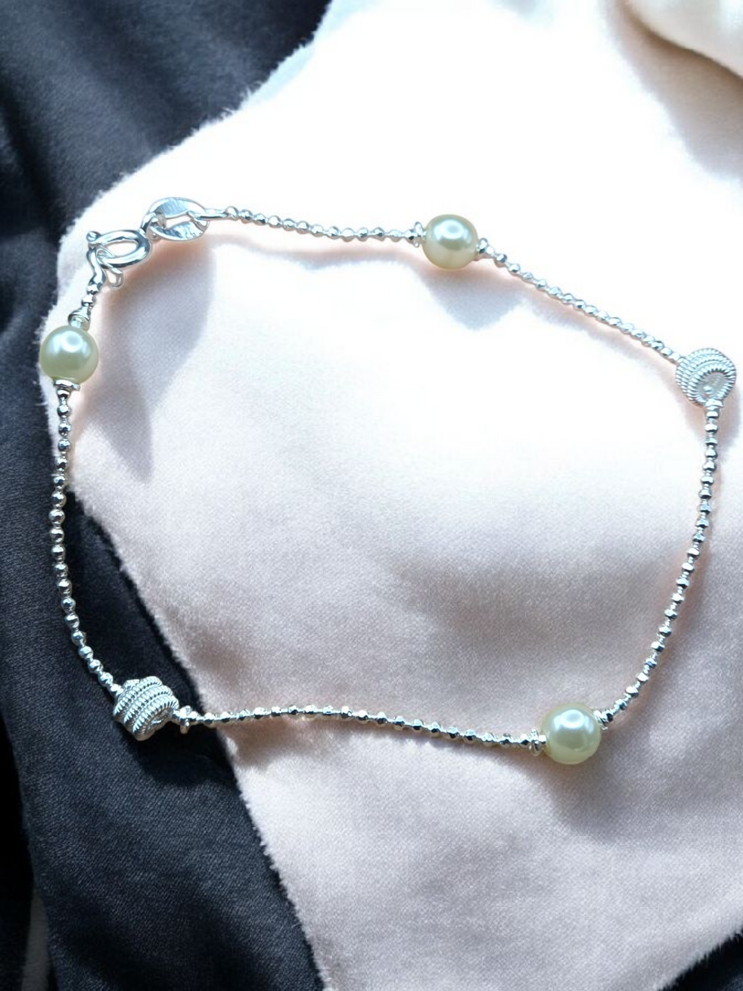 Pulsera perlas y trenzado